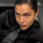 Woman wearing FREJA WEWER x PILGRIM Firenze hoops, medium silver-plated, showcasing their bold, chunky silhouette.