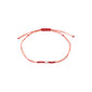 APRIL birthstone bracelet featuring a minimalist red string with a small Rock Crystal bead, symbolizing positivity and clarity, perfect for a subtle, personal style.