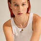 LIBRA Zodiac Sign Coin Necklace, silver-plated, featuring a round pendant with crystal stones, worn by a woman with red hair and a white tank top.