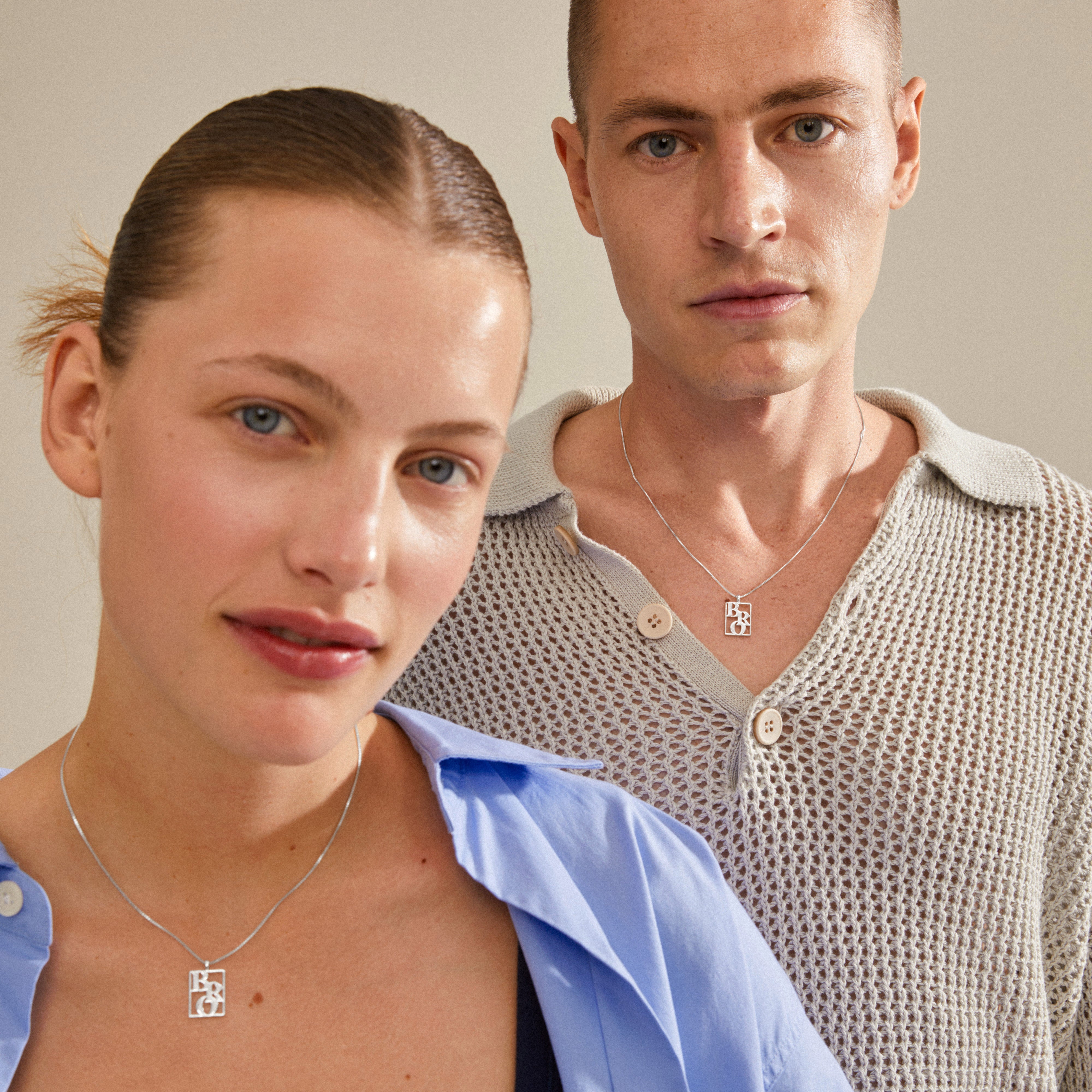 LOVE TAG, BRO necklace with silver-plated chain, featuring a bold square pendant engraved with BRO. A stylish piece from Pilgrim's Danish jewelry collection.