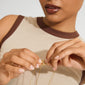 Hands fastening the clasp of a gold-plated, multi-strand necklace, showcasing the Lock with 2 Lobsters for a stylish, tangle-free layered look.