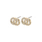 VICTORIA crystal earrings, gold-plated intertwined rings adorned with bright crystal stones, embodying Pilgrim's blend of timeless and trendy Scandinavian craftsmanship.