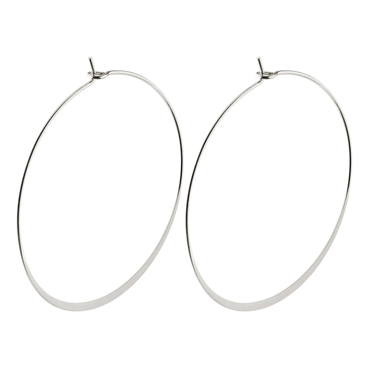 TILLY large silver-plated hoop earrings from Pilgrim, showcasing a sleek, airy design and bold 50 mm diameter for a fresh, feminine look.