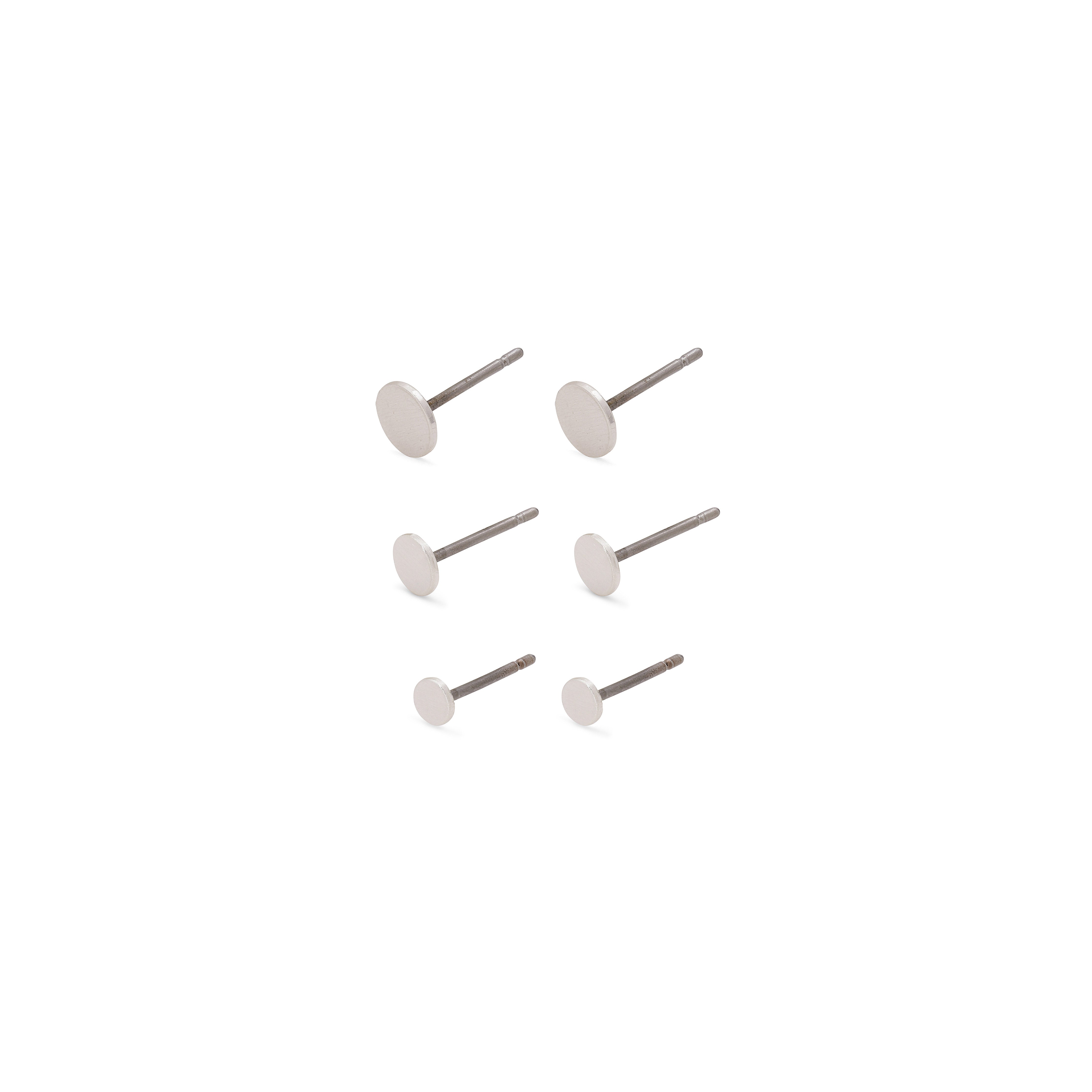 NORMA 3-in-1 set earrings, silver-plated, showcasing multiple nails symbolizing diverse stud sizes for versatile styling. Perfect for minimalist or layered looks.