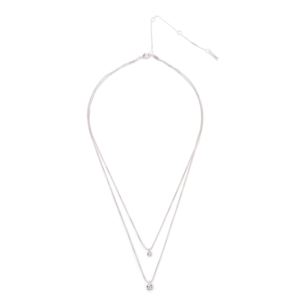 LUCIA 2-in-1 crystal necklace silver-plated, featuring dual chains with sparkling crystal pendants, elegantly designed to highlight the décolleté.