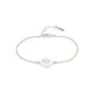 ELIN coin bracelet, silver-plated, featuring a slender chain and a circular pendant with an etched tree of life design, embodying chic Scandinavian style.
