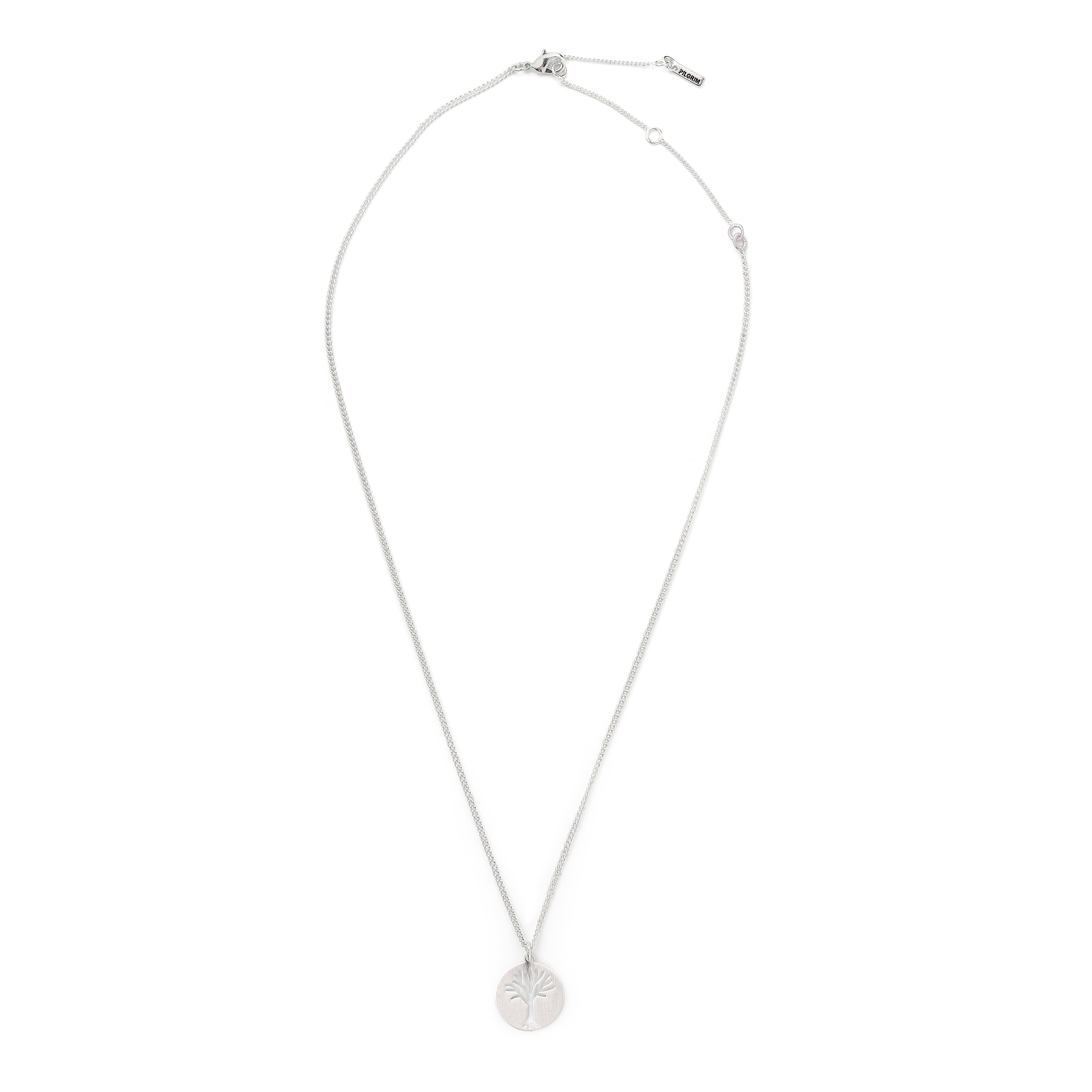ELIN coin pendant necklace silver-plated features a round pendant with a cut-out tree design, paired with a 40 cm adjustable chain for a modern Scandinavian look.