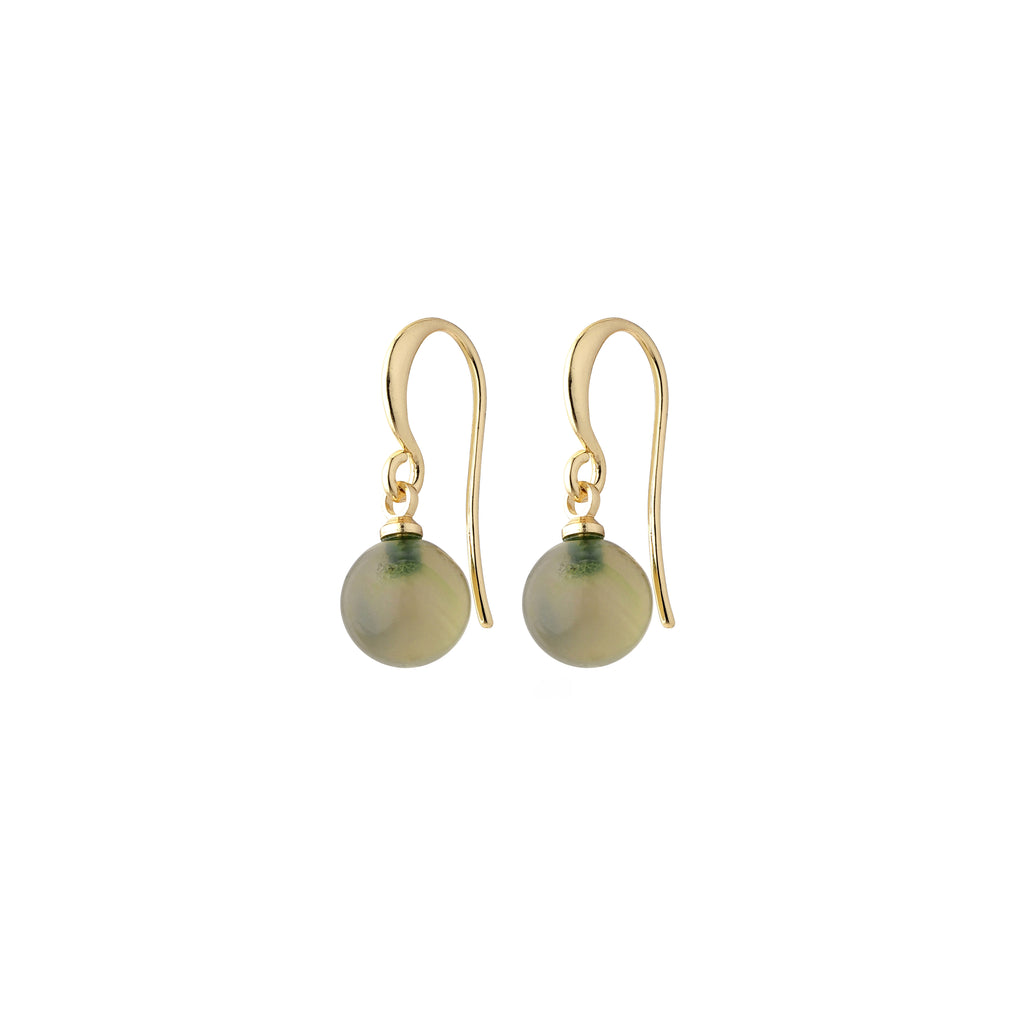 GOLDIE green earrings, gold-plated with a grey-green glass bead pendant, showcasing Scandinavian charm and elegance. Ideal for trendsetters seeking a stylish accessory.