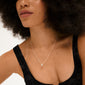 EMMETT necklace, silver-plated, features a heart pendant encrusted with Preciosa crystals, offering a chic, minimalist style. Crafted from 97% recycled materials, ideal for any occasion.
