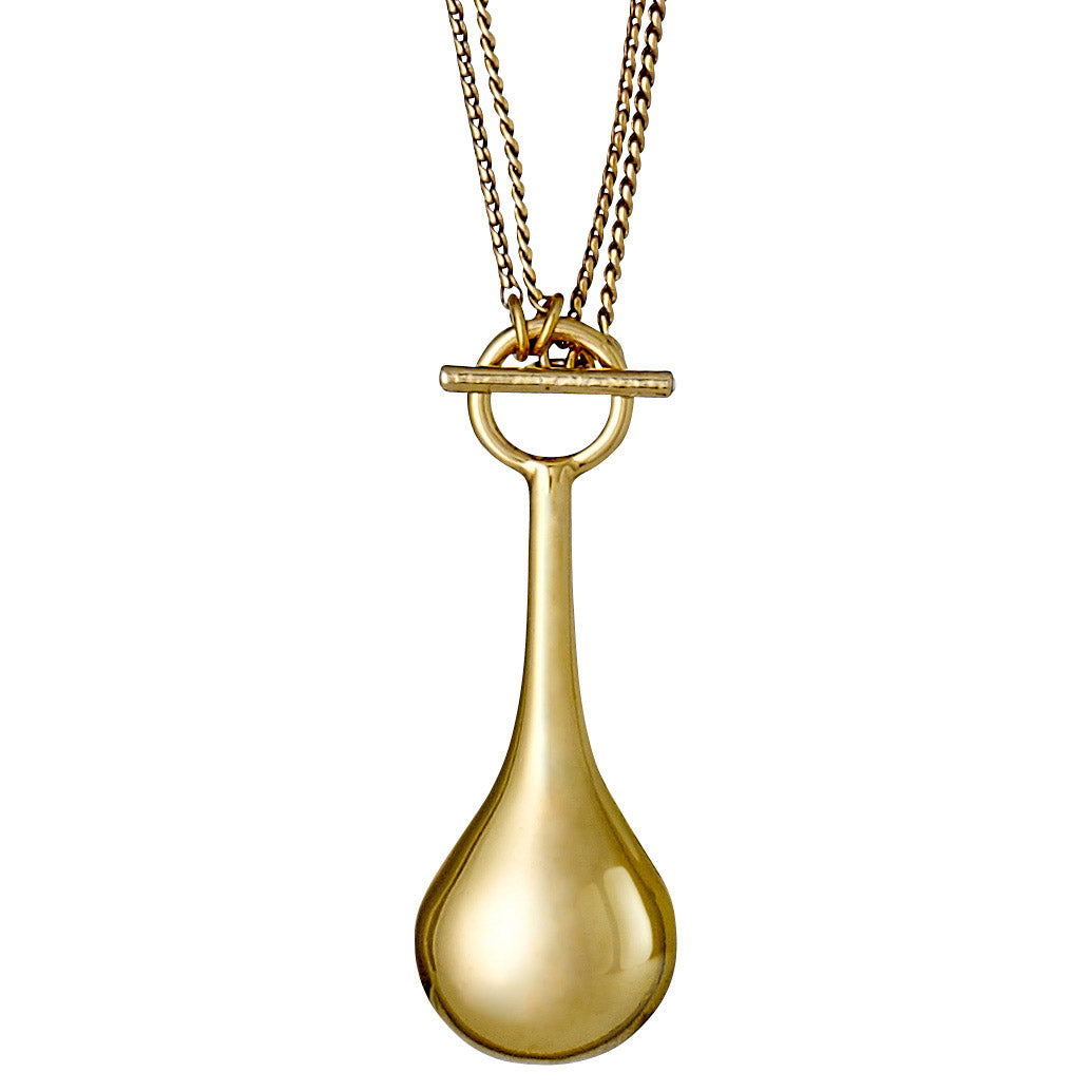 NATALIE gold-plated necklace featuring a glossy drop-shaped pendant and versatile chain, perfect for creating a personalized style statement.