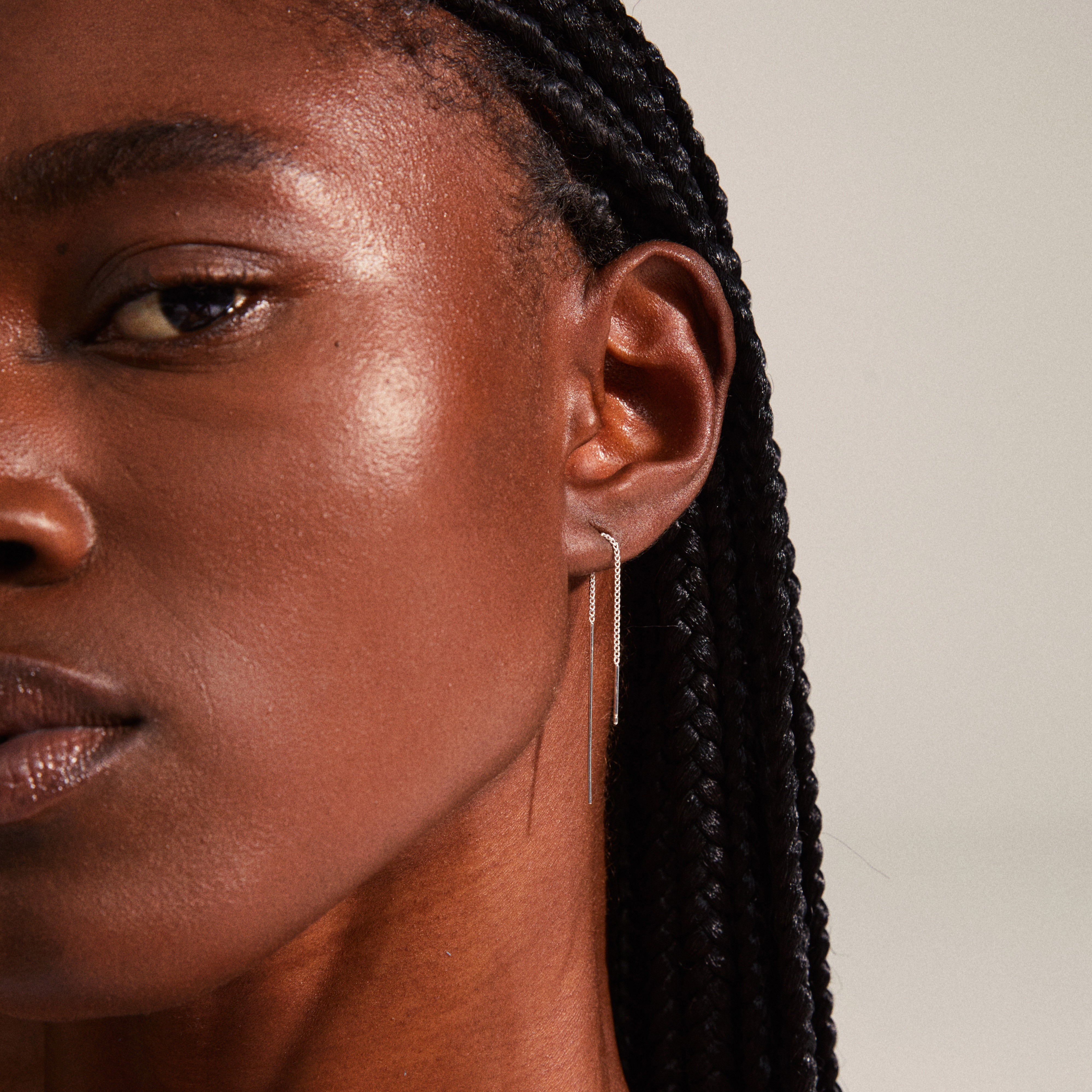 TAHOE chain earrings silver-plated, featuring a stylish slim bar and chain design, perfect for versatile ear curation and pairing with hoops for an edgy look.