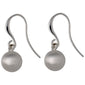 AMALIA earrings, silver-plated, feature a satin-matt ball design with elegant dangle style, offering versatile movement. Perfect for trendsetters seeking timeless Scandinavian-inspired jewelry.