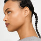 Profile view highlighting AVA star earrings, silver-plated with a velvet-matt finish, worn on a person with slicked-back hair and subtle freckles.