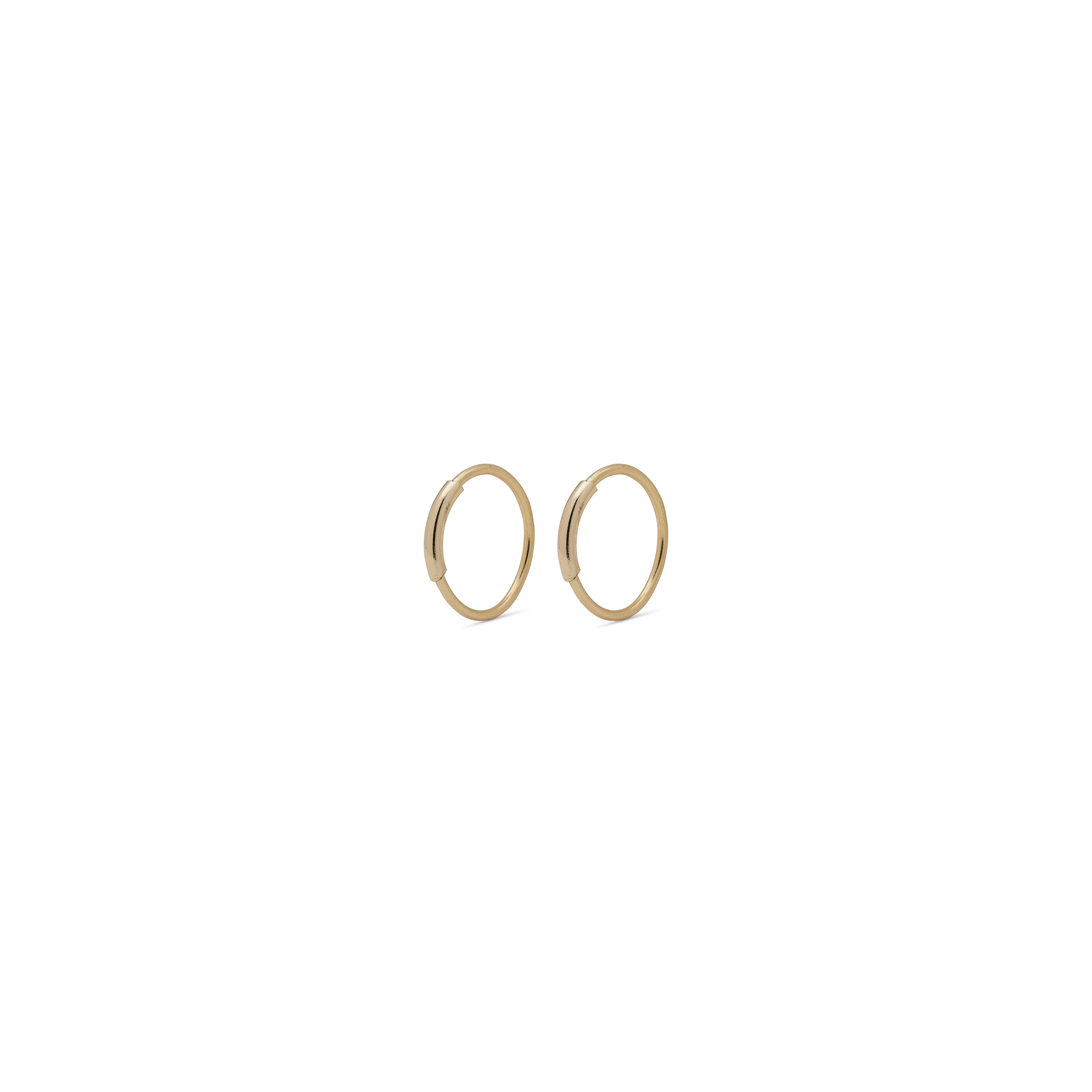 RAQUEL mini hoop earrings, gold-plated, featuring a minimalist design with an intriguing outer piece detail, perfect for versatile, stylish looks.
