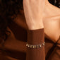 CAROL armband m. små filigranmynt guldpläterat
