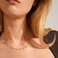 MAJA crystal multi drops necklace gold-plated on a woman's neck, featuring sparkling Preciosa crystals, embodying a romantic and feminine style.