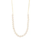 BERTHE pearl necklace, gold-plated, featuring unique freshwater pearls with playful shapes, creating a classy yet natural look. Ideal for layering with other chains.