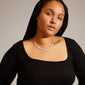 BERTHE pearl necklace silver-plated on woman, featuring delicate chain with genuine freshwater pearls, showcasing Pilgrim's elegant, timeless design.