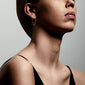 Silver-plated TILLY earrings showcased on a woman in a black dress, capturing their versatile elegance for both everyday and evening wear.