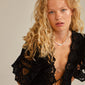 RELANDO pearl necklace silver-plated, featuring white glass pearls and a chunky curb chain, elegantly worn by a woman with blonde hair.