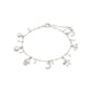 Silver-plated PRUCENCE bracelet from Pilgrim featuring diverse charms like hearts, moons, and seashells, adorned with freshwater pearls and Preciosa crystals.