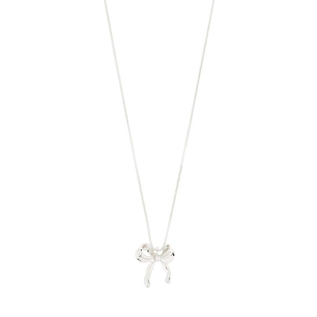 CASSIAN necklace silver-plated features a sleek bow pendant on a slim box chain, ideal for a trendy, minimalist look.