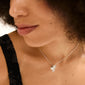 Silver-plated LUIS necklace with a sleek box chain and abstract flower pendant, 38 cm long with a 9 cm extension, highlighting minimalist elegance.