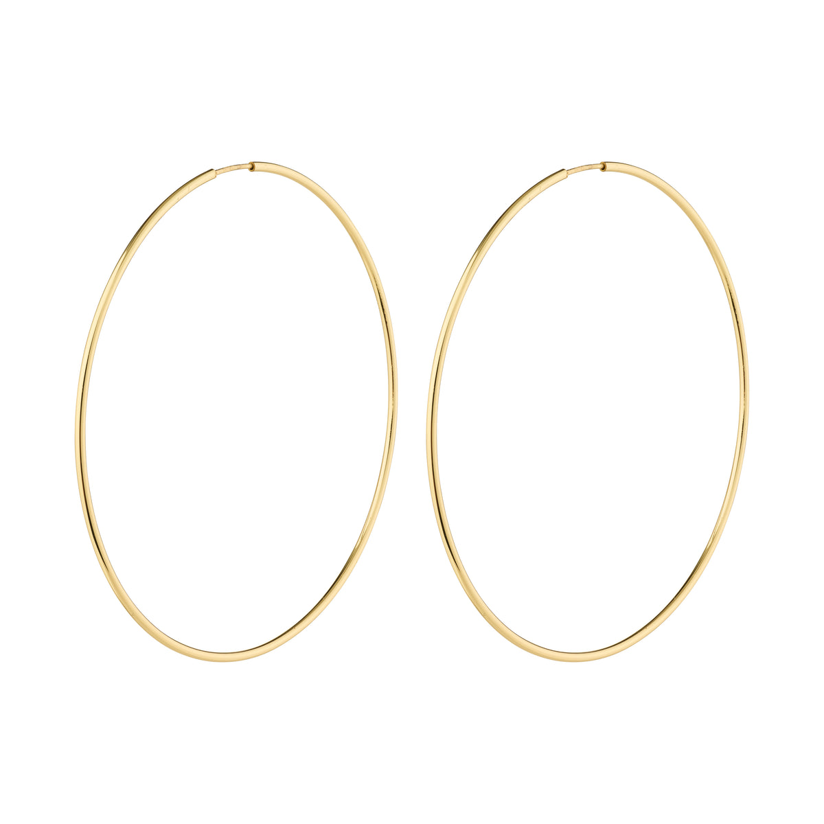 SANNE X-large gold-plated hoop earrings by Pilgrim, featuring a sleek, airy design for a chic, feminine look. Perfect for stylish, effortless elegance.