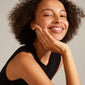 LULU twirl stack ring silver-plated worn by a smiling woman, showcasing its elegant design, ideal for trendy stacking with Pilgrim's stylish rings.