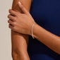 Close-up of arms wearing a sleeveless top, showcasing the silver-plated PAM rope chain bracelet, a stylish, versatile piece for daily wear.