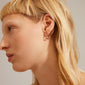 COBY crystal square hoop earrings gold-plated with sparkling Preciosa crystals, worn by a woman with blonde hair, showcasing elegant shine and classic design.