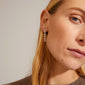COBY crystal earrings silver-plated showcased on a woman, highlighting their retro squared shape and sparkling Preciosa crystals for a glam look.