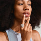 Woman wearing the LUCA silver-plated ring with a unique, handcrafted bohemian look, featuring organic shapes and an adjustable fit for personal style expression.