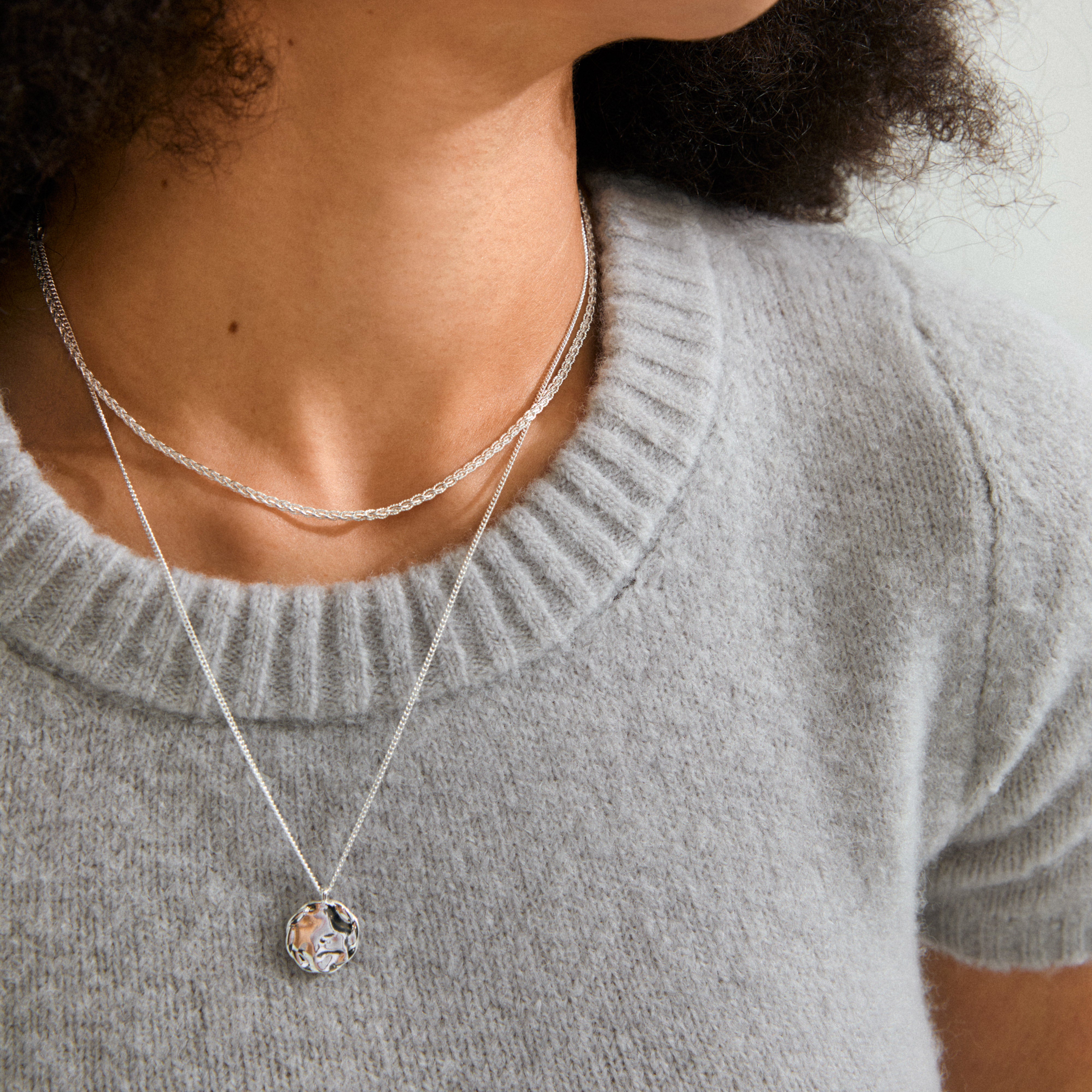 DECLAN necklace 2-in-1 set, silver-plated, featuring a braided chain and a coin-chain with pendant. Ideal for layering or solo wear, 99% recycled material.
