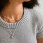 DECLAN necklace 2-in-1 set, silver-plated, featuring a braided chain and a coin-chain with pendant. Ideal for layering or solo wear, 99% recycled material.