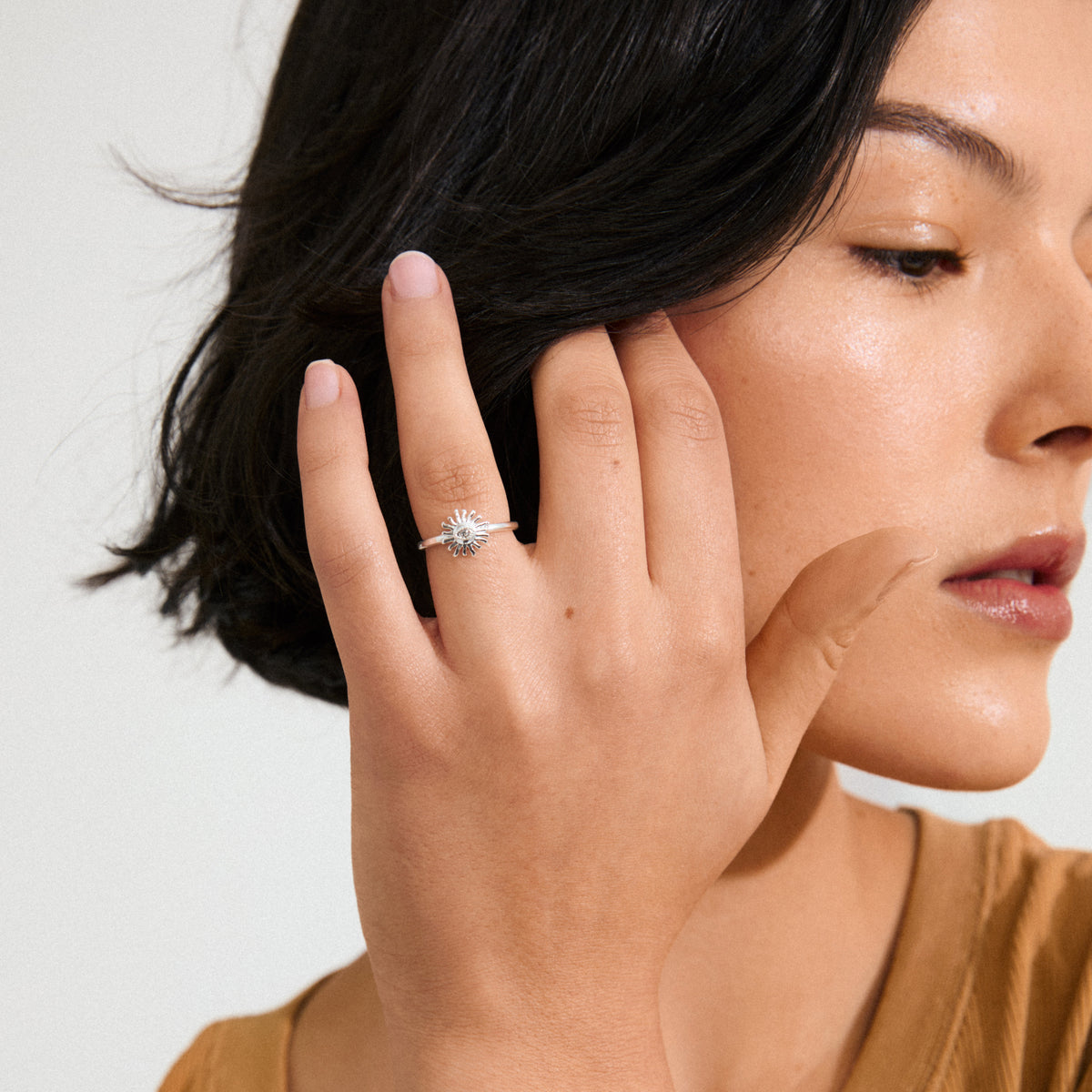 LULU sun stack ring silver-plated from Pilgrim, featuring a radiant sun design with a central crystal eye, perfect for a unique, stylish statement.