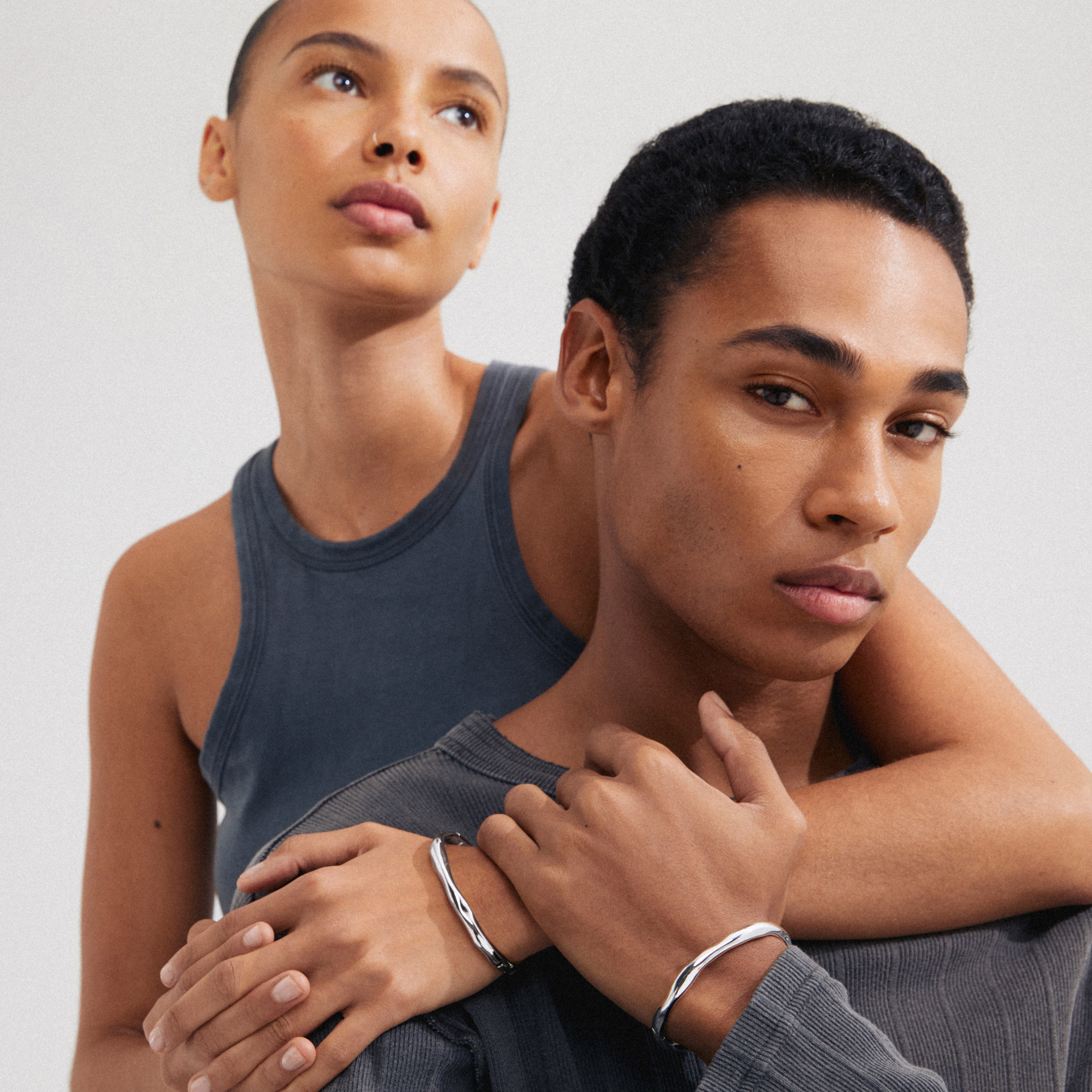 Silver-plated HARRISON bangle with wavy design, click clasp, and Scandinavian style, crafted from 99% recycled material by Pilgrim.