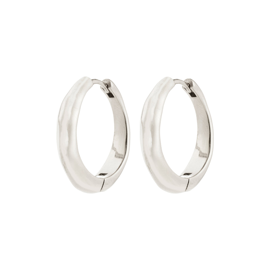 Silver-plated HARRISON hoops with wavy design and click clasps, offering a stylish Scandinavian touch; crafted from 99% recycled materials by Pilgrim.