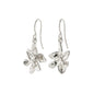 RIKO silver-plated earrings with nature-inspired flower pendants, crafted from recycled materials, showcasing Pilgrim's eco-friendly, handmade Danish design.