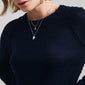 ZHURI necklace 2-in-1 set showcases layered silver-plated chains, featuring a key and floral charm, epitomizing Pilgrim's blend of timeless, trendy Danish craftsmanship.