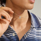 Silver-plated AFRODITTE heart necklace, elegantly worn, showcasing a classic design with a heart pendant, ideal for versatile styling and gifting.