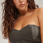 AFRODITTE heart necklace silver-plated, worn by a woman with long brown hair, showcasing its elegant heart pendant against a strapless dress.