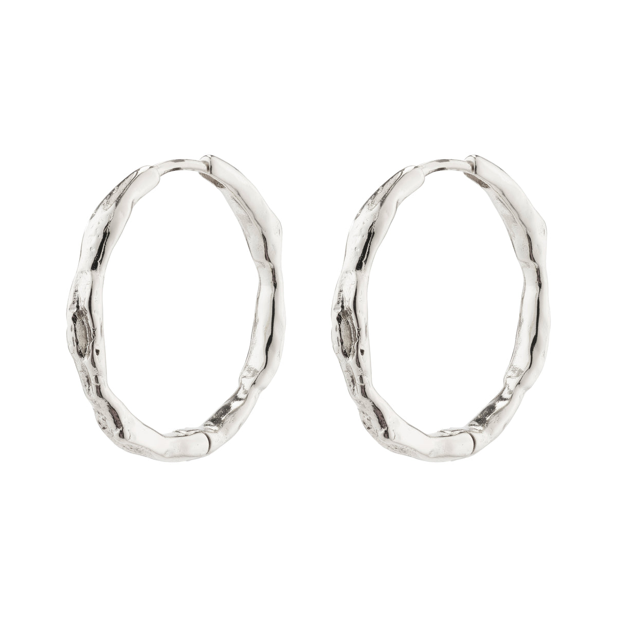 EDDY organic-shaped large silver-plated hoop earrings with a wavy, handcrafted design, perfect for adventurous, stylish individuals seeking unique, Scandinavian-inspired jewelry.