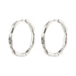 EDDY organic-shaped large silver-plated hoop earrings with a wavy, handcrafted design, perfect for adventurous, stylish individuals seeking unique, Scandinavian-inspired jewelry.