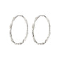 EDDY organic shaped maxi hoops, silver-plated with a wavy surface, showcasing Pilgrim's handcrafted, Scandinavian style. Perfect for enhancing any outfit or adventure.