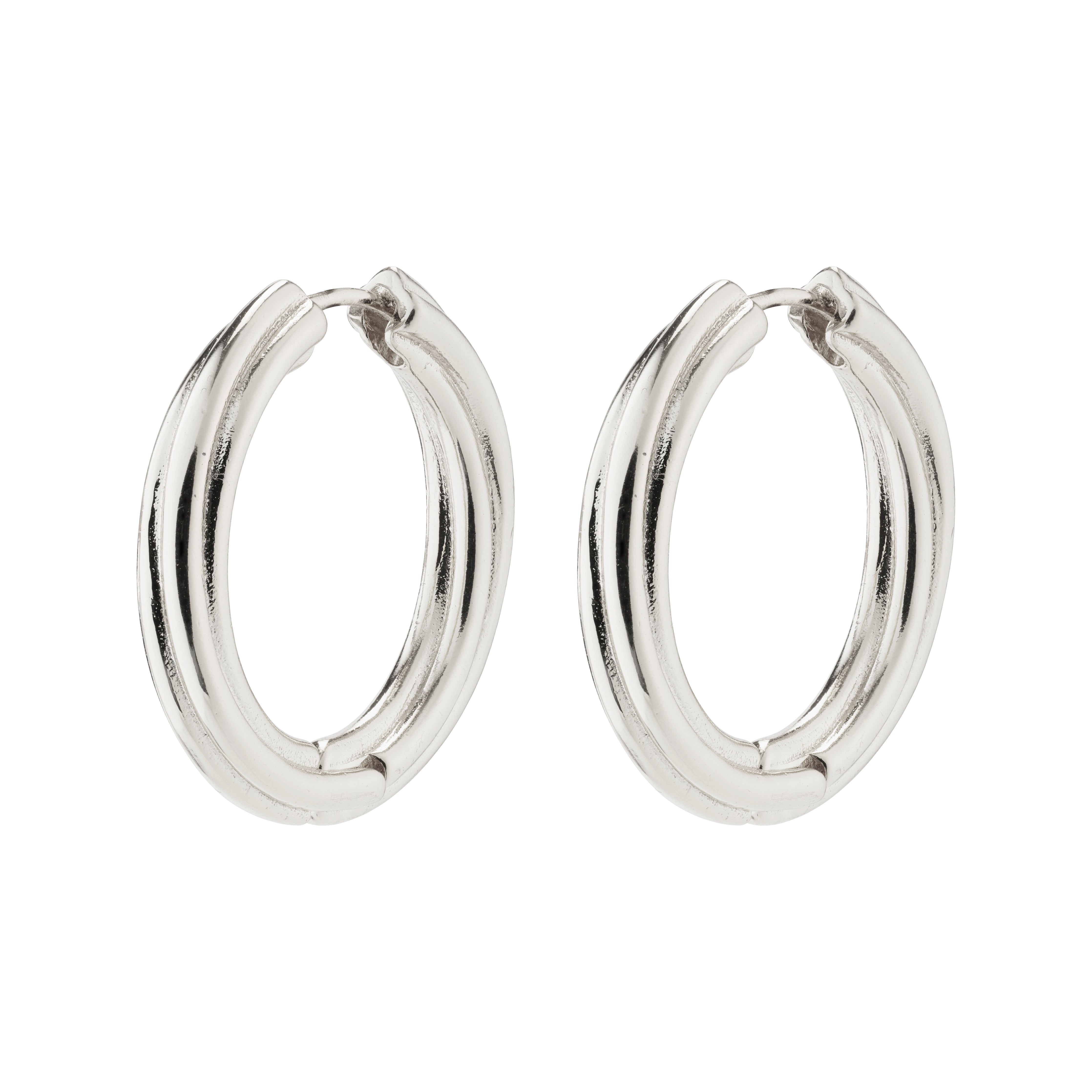 EDEA hoops silver-plated, chunky silver earrings with a twisting design and click lock, made from 99% recycled material, embodying timeless yet trendy Scandinavian style.
