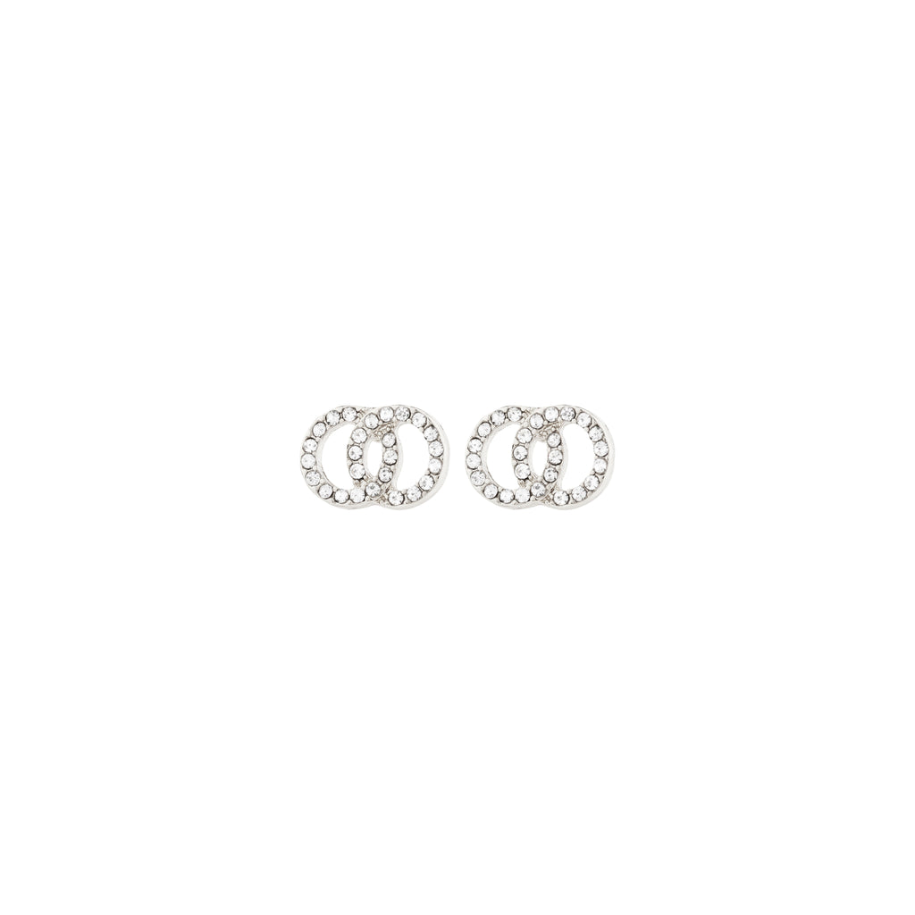 JOLINA recycled earrings, silver-plated, feature intertwined halos adorned with sparkling Preciosa crystals, reflecting Pilgrim's blend of timeless and trendy Danish design.