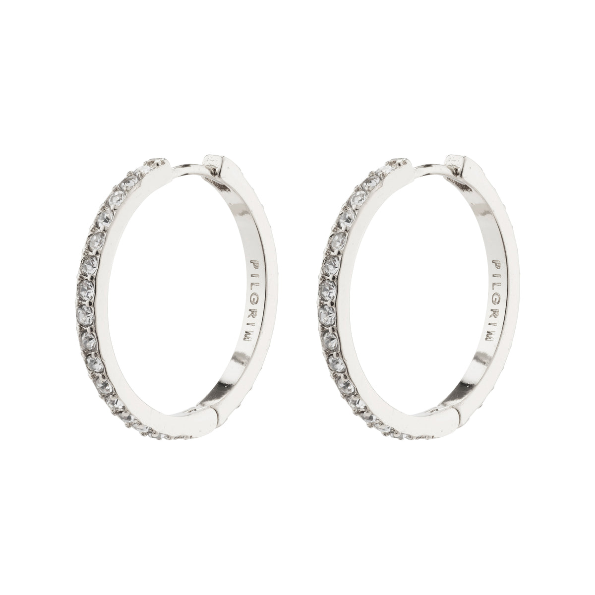 EBNA large crystal hoops silver-plated, featuring Preciosa crystals, offer sparkle and glam with a smart click lock, perfectly aligning with Pilgrim's trendy, inclusive style.