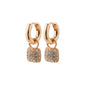 CINDY crystal hoop earrings, rosegold-plated, featuring squared pendants with sparkling Preciosa crystals, embody elegance and modernity from Pilgrim's recycled jewelry collection.