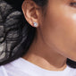 INAYA earrings silver-plated, close-up view. Features small abstract seashell studs with a central white glass bead, showcasing Pilgrim's detailed craftsmanship.
